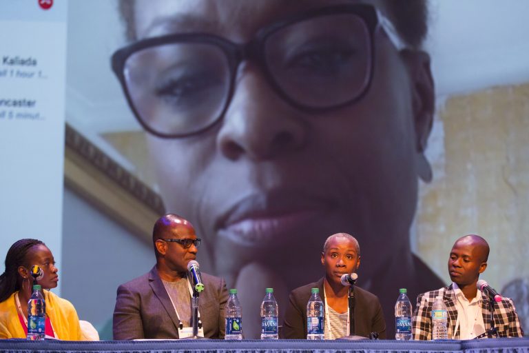 Moderator Sonja Parks, Lab Fellow Manuel Viveros, Josette Bushell-Mingo, Lloyd Nyikadzino, and Nike Jonah (via Skype) speak in the session "Race, Colonization & Art: An Afro-Global Perspective." (Photo by T Charles Erickson)