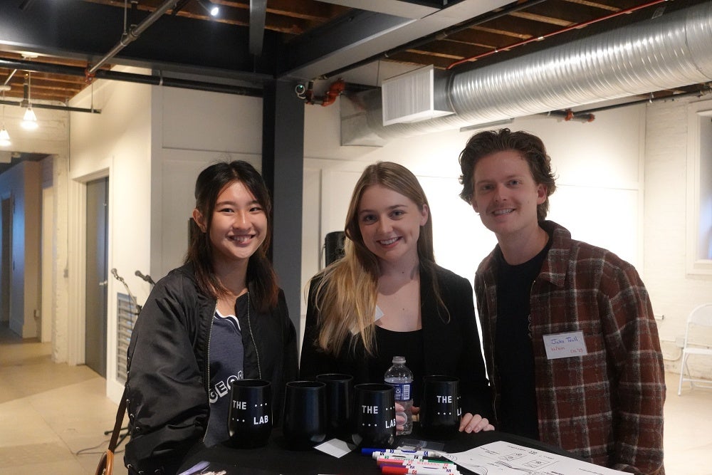 Jameson Nowlan, Student Fellows Coordinator/ Social Media Manager, pictured with student fellows.