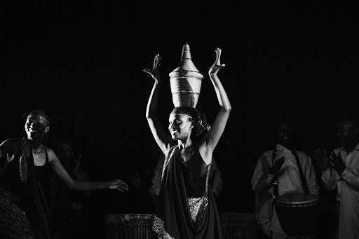 [Umushayayo (on the left) and Guhamiriza (on the right) traditional Rwandan dances Dancers: Ada Umugwaneza (on the left) and Sam Kwizera (on the right)/ photos by Leslie Akanyonyi]