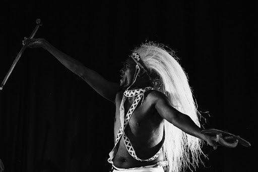 [Umushayayo (on the left) and Guhamiriza (on the right) traditional Rwandan dances Dancers: Ada Umugwaneza (on the left) and Sam Kwizera (on the right)/ photos by Leslie Akanyonyi]