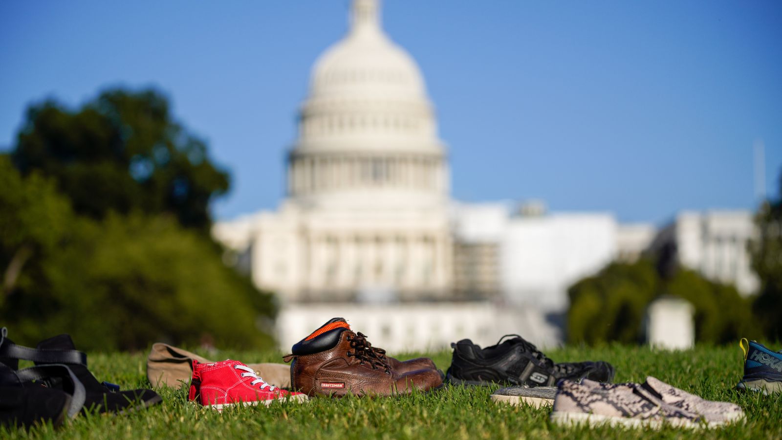 Hundred of pairs of shoes were placed in front of U.S. Capitol as a visual representation of the journeys of millions of refugees and children on the move.